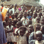 Lorella greets kids in Congo 1982