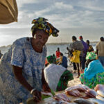 Women selling fish on the beach