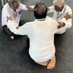 India pastors gather for prayer.